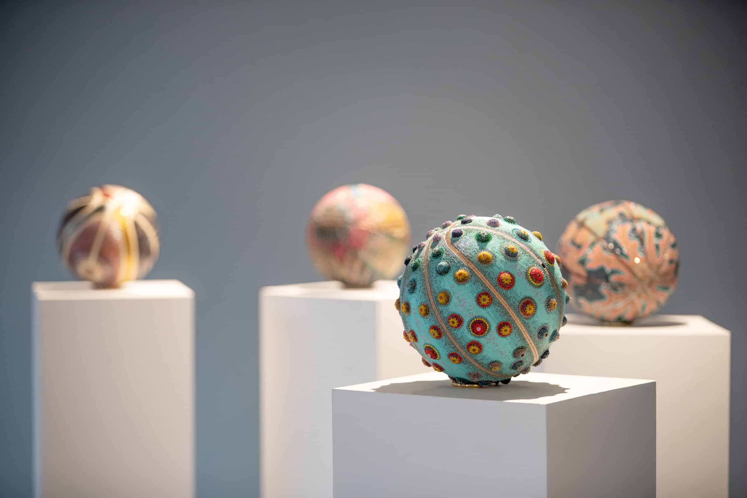 Sculptural quartet of beaded basketballs